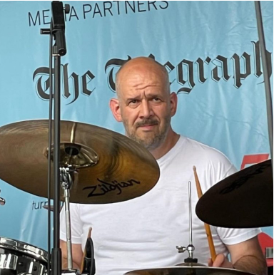 Ian Backhouse playing drums
